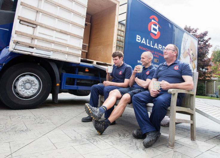 Ballards employees having a break after a house removal