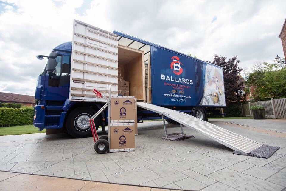 Ballards Removals truck in driveway during house move