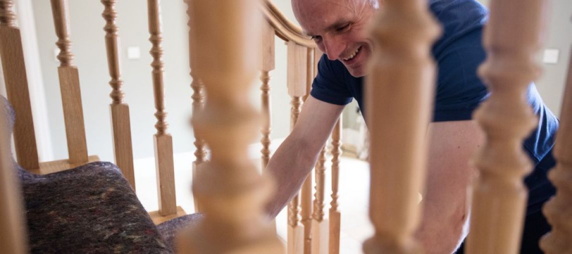 Laying dust sheets on stairs