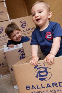 Children in Ballards Removals boxes