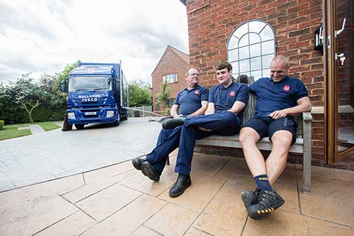 Ballards Removals team take a break after helping client to move house