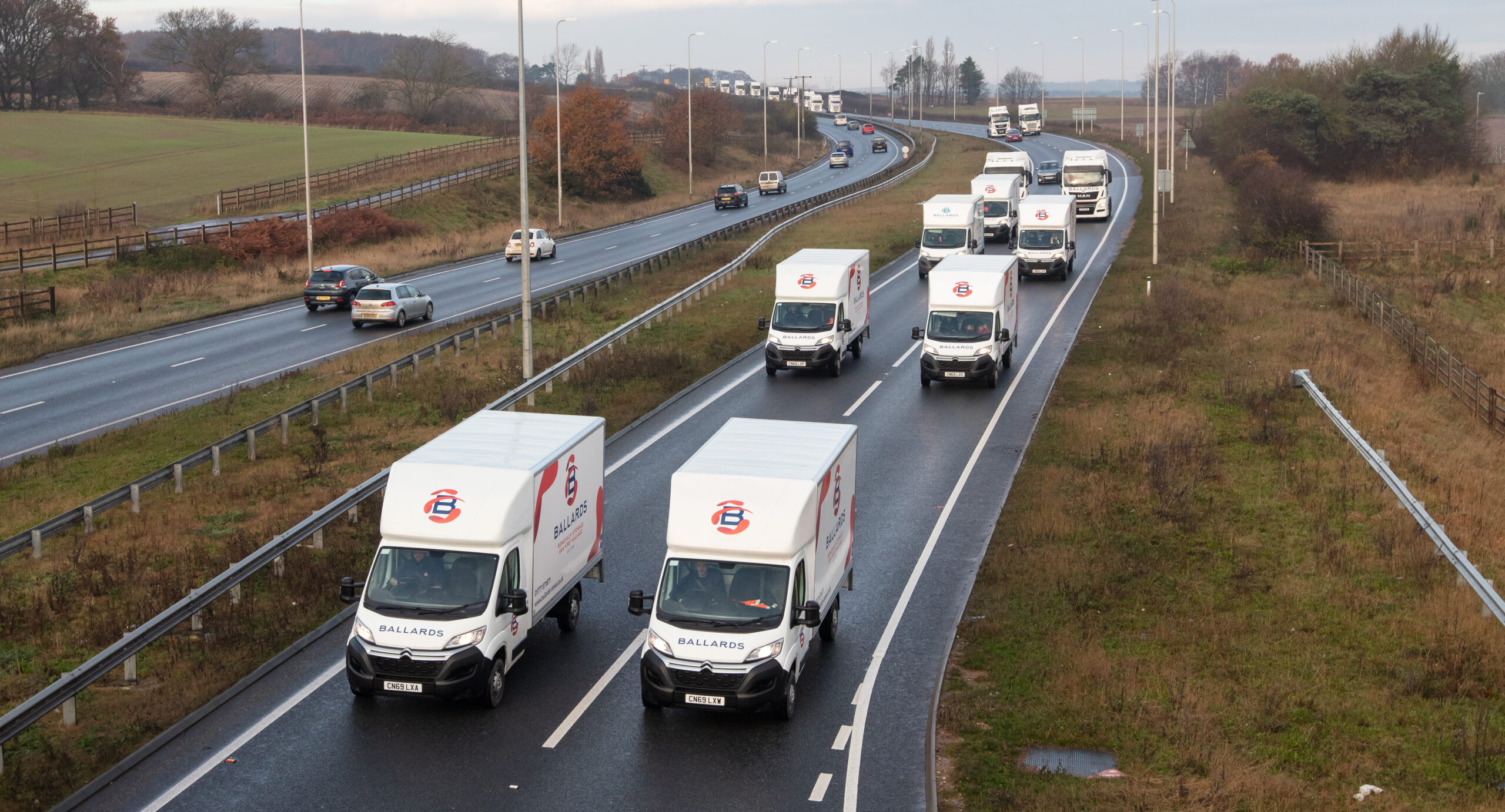 Ballards Removals lorries and vans on motorway