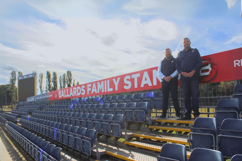 Matt Ballard and Joe Ballard standing in the new Ballards Family Stand at the Doncaster Knights stadium