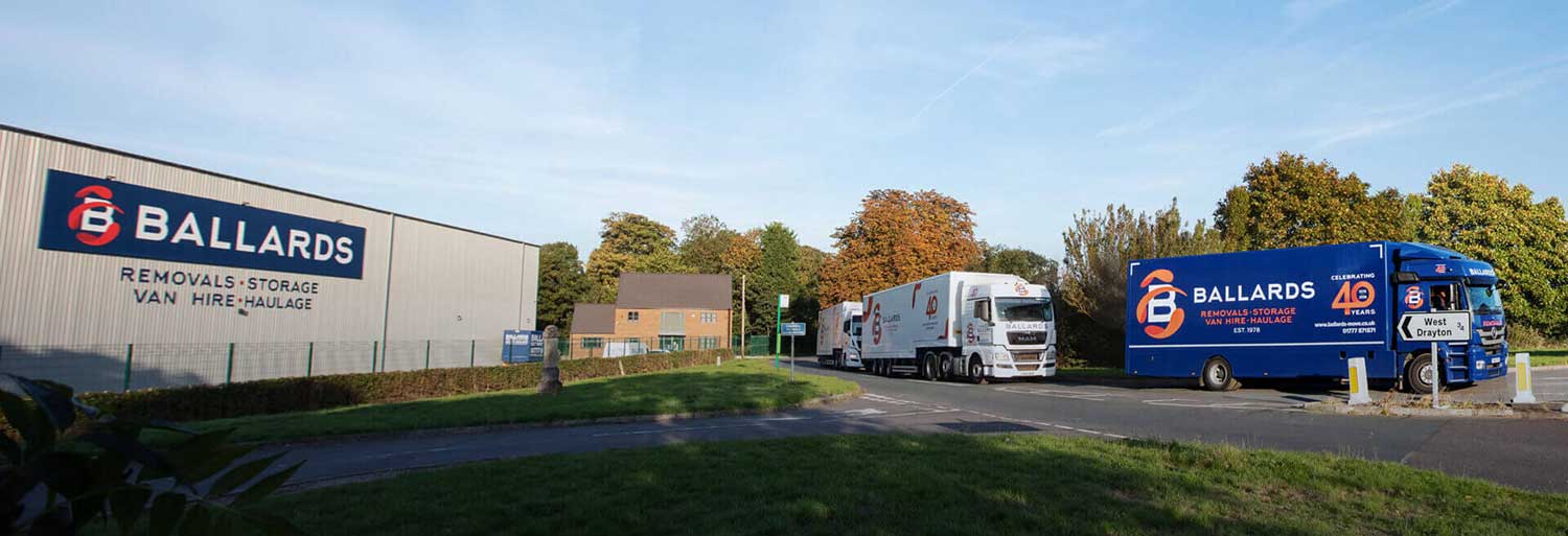 Ballards removals lorries leaving head office in Retford