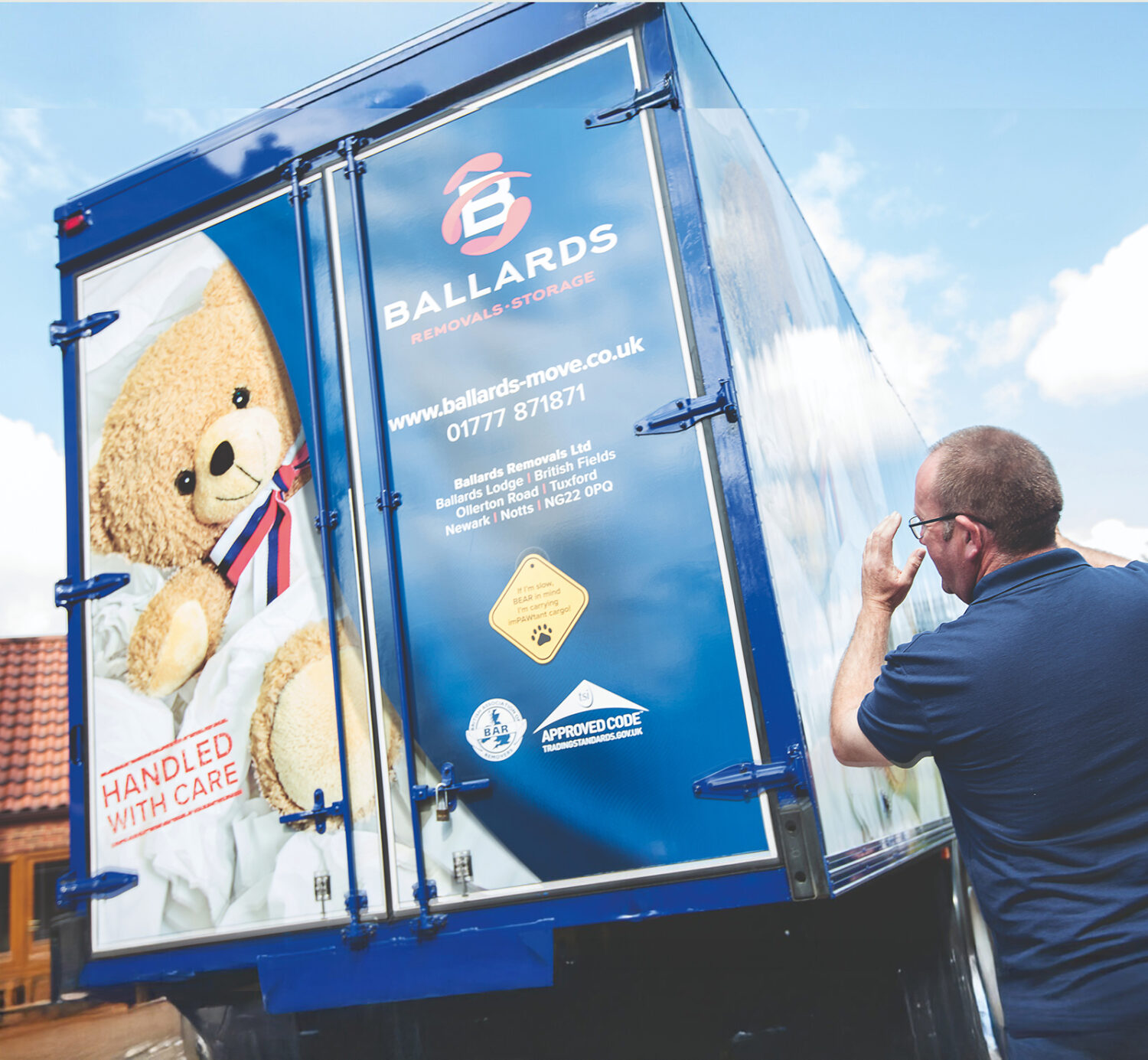 Ballards staff directing a removals truck