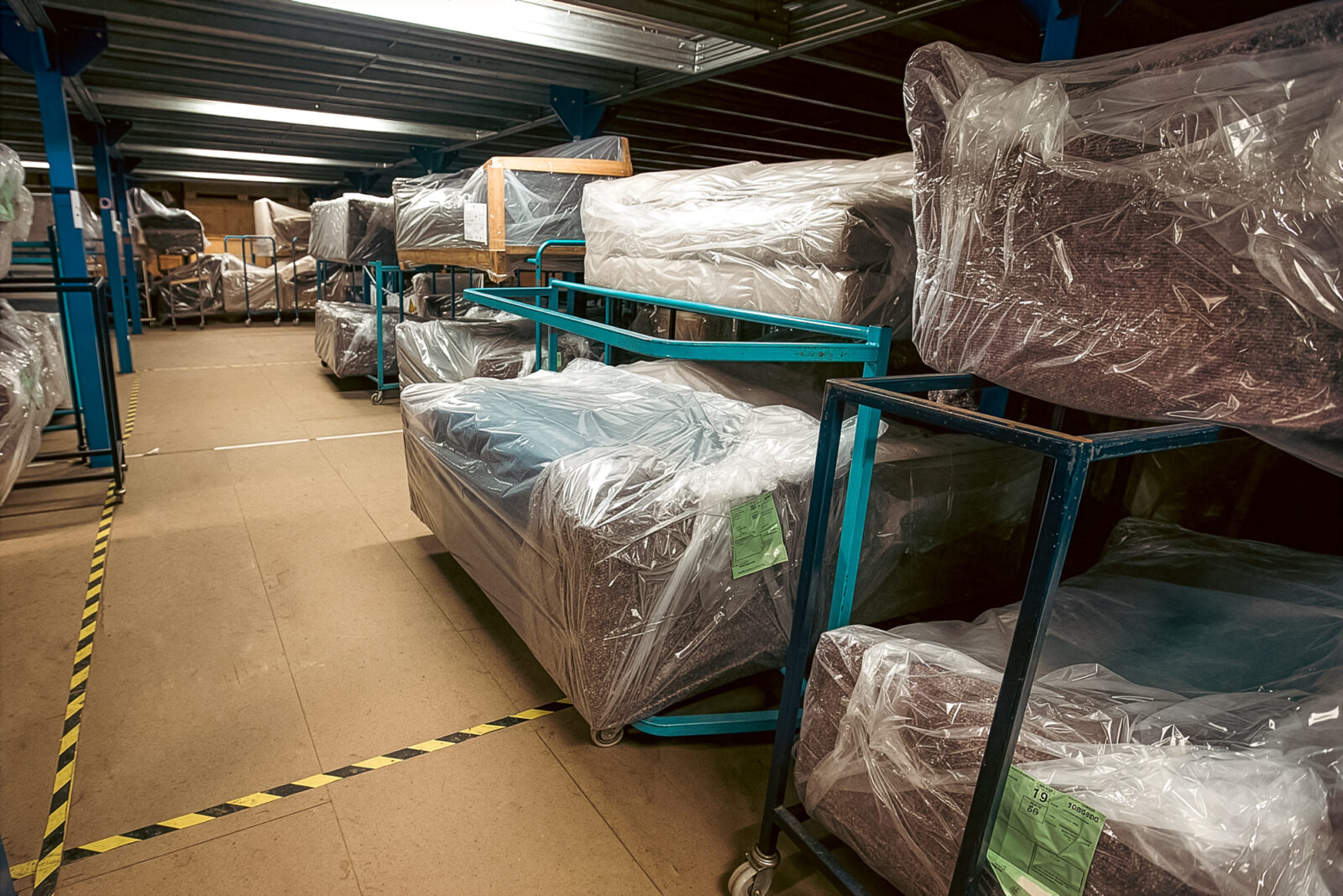 Furniture Safe Storage - storage with sofas wrapped in protective packaging