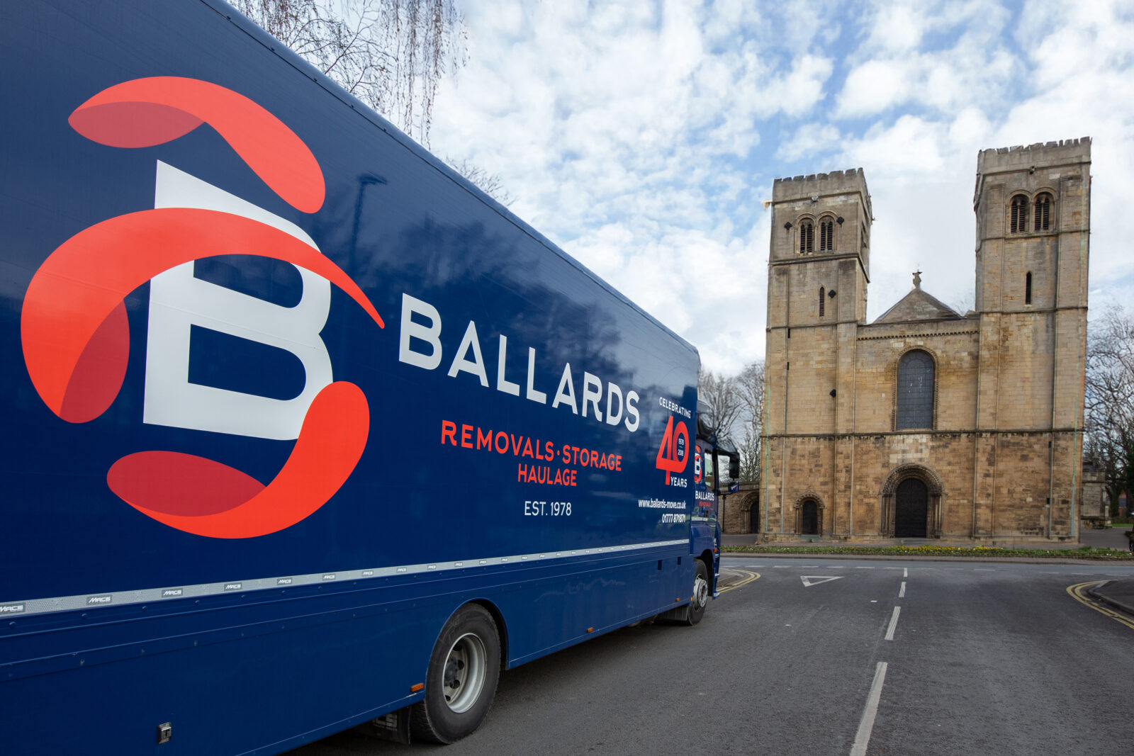 Ballards removals lorry parked outside Worksop Priory