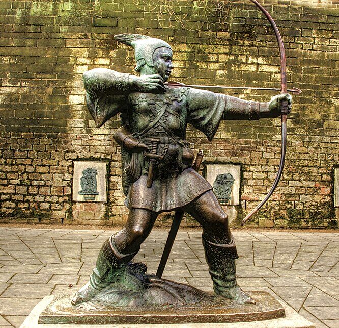 Robin Hood statue outside Nottingham Castle, a famous landmark associated with the city’s legendary folklore and history.