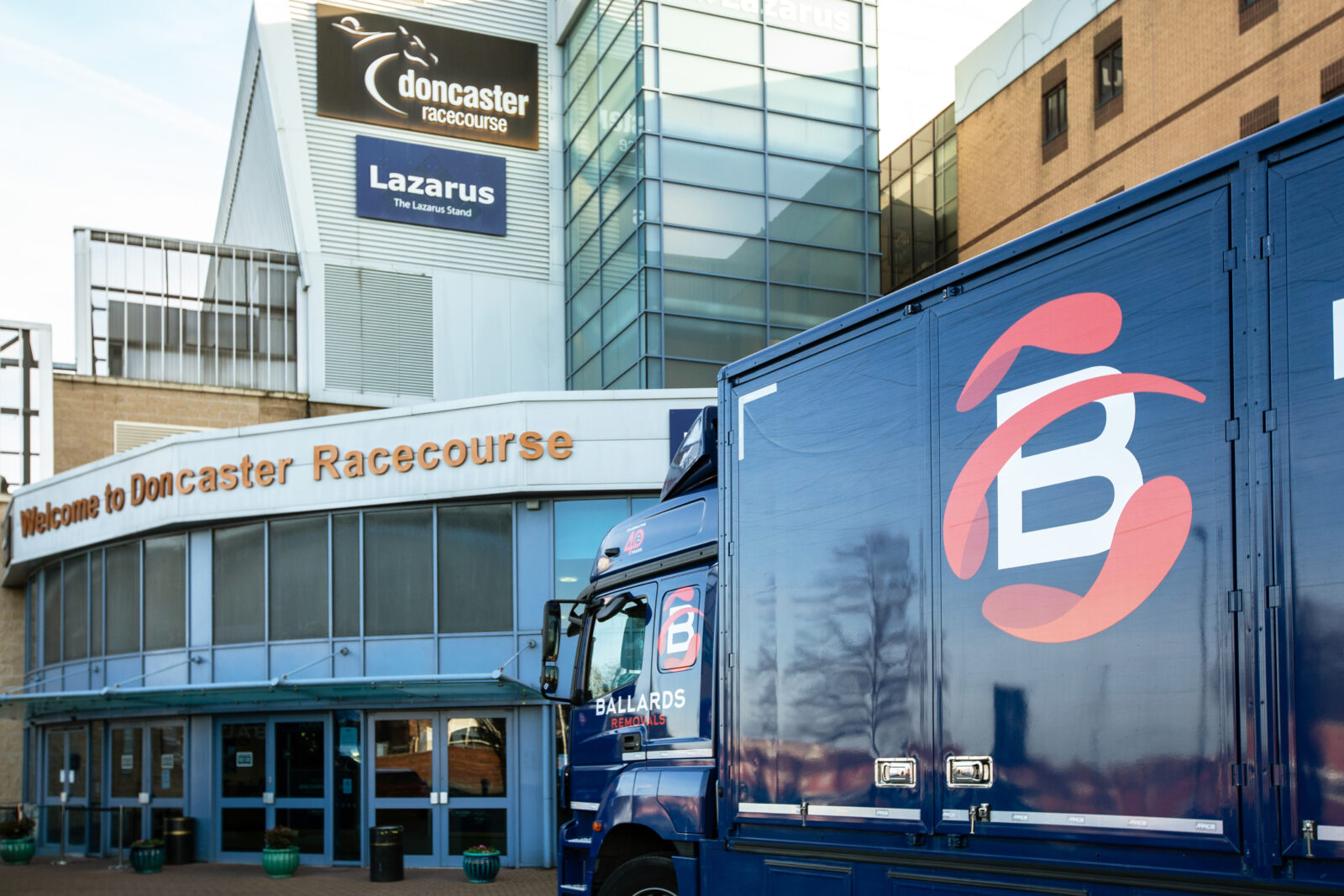 Ballards Removals van parked outside Doncaster Racecourse.