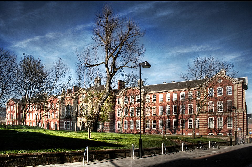 The Sir Frederick Mappin Building on Mappin Street at the University of Sheffield, showing its historic stone facade and architectural detailing.